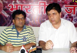 BJP State spokespersons, Balbir Ram and Sunil Sethi addressing the press conference on Monday.