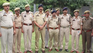 Police officers during a piping ceremony-cum-farewell party at DPL Jammu. 