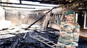 GOC 15 Chinar Corps Lt Gen Subrata Saha inspecting Sainik School Manasbal after its hostel building gutted in a fire incident.