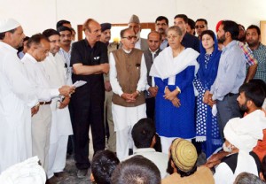 Senior AICC leader Ghulam Nabi Azad, Ambika Soni and Prof Saif-ud-Din Soz listening to the problems of flood affected people at Poonch on Tuesday.—Excelsior/Harbhajan