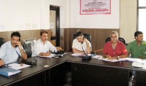 Amit Sharma, Nodal Officer 24x7 Connect Centre and other officials trying to locate missing persons from their office in Jammu on Wednesday.— Excelsior/Rakesh