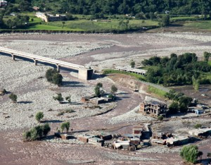 An aerial view of washed away bridge over river Betar in Poonch on Monday.