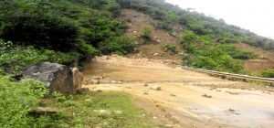 Massive landslides on Jammu-Srinagar National highway at Kheri, around 4 kms from Udhampur towards Kud on Wednesday.