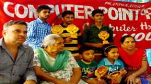 Winners in chess posing alongwith chief guest Jiven Lata Gupta during Prize Distribution Function on Sunday.