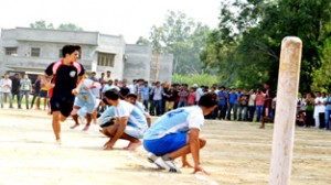 Players in action during the final of Men’s Kho-Kho match held at Sports Ground, University of Jammu.