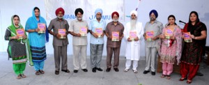 Dignitaries releasing Annual College Magazine at SMS College of Education in Jammu on Monday.