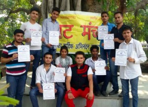 Winners displaying certificates during prize distribution ceremony organized by Nat Manch.