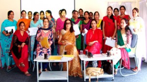 Beneficiaries along with JUDA officials posing for a group photograph after stipend distribution, at Jammu.