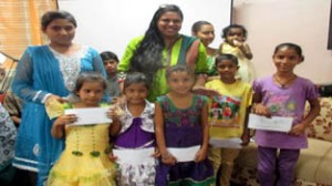 Students posing for photograph after receiving scholarship.