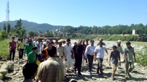 MLA Shabir Khan visiting flood hit areas in Thanamandi on Sunday.