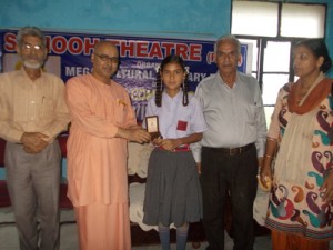 Winner being felicitated during the concluding ceremony of cultural and literary event.