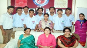 The winners of Quiz competitions posing with faculty members at Model Academy in Jammu