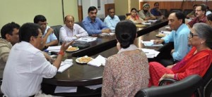 Divisional Commissioner reviewing relief and rehabilitation measures in a meeting on Sunday.