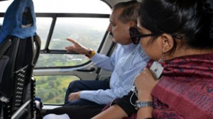 Union Minister Dr Jitendra Singh conducting aerial survey of flood-hit Pancheri, Saddal and Muttal in district Udhampur on Saturday.