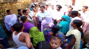 JMC Commissioner Kiran Wattal & Bimla Luthra interacting with people at Purkhoo on Tuesday.