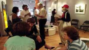 Suman Gupta explaining his subjects of art works at Christine Frechard Gallery in US.