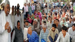 Minister for Planning, Ajay Sadhotra and Provincial President NC, Devender Singh Rana interacting with people at Sadal on Friday.