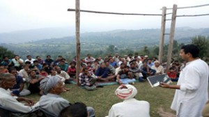 Pathania addressing the gathering at Ramnagar on Sunday.