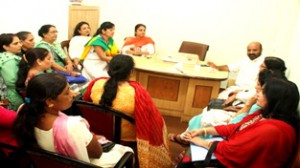 Mahila Morcha activists in a meeting to discuss measures for relief to flood victims.