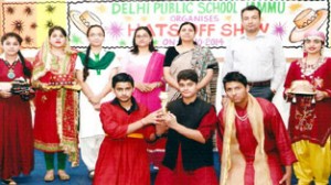 Winners of Hats-off Show posing for a photograph along with dignitaries at DPS in Jammu.