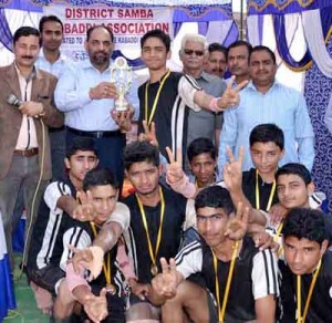 Winners of the District Kabaddi Championship posing along with the dignitaries and officials at Unique Public School Jatwal in Samba.