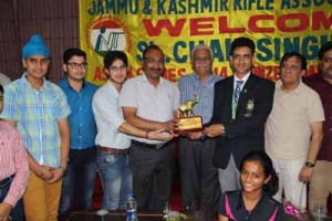 JKRA president and ADGP Dilbagh Singh along with others presenting a memento to bronze medalist, Chain Singh, at Jammu on Wednesday.