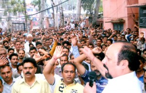 Som Nath, Sr. Vice President PHE Employees Association Jammu province leading a rally at Udhampur on Saturday.