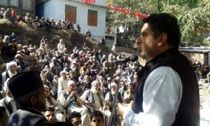 MLA Poonch Ajaz Jan addressing a public meeting in his constituency on Monday.