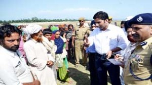 DDC Kathua Dr Shahid Iqbal interacting with inmates at a relief camp on Friday.