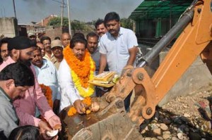 Minister for Housing, Raman Bhalla laying foundation stone of storm water drains on Friday.