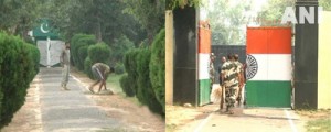 Pakistan Rangers clean their posts after seeing BSF jawans at R S Pura tidying up their posts at Octroi in Suchetgarh Sector.