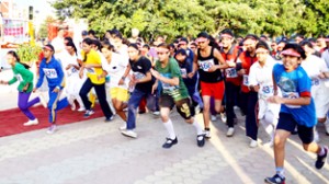 Children running during ‘Run for Unity’ organized by CRPF Jammu sector at Gulshan ground, Jammu on Sunday.