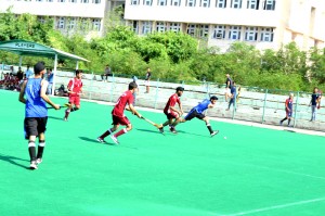 Players in action during a hockey match in the ongoing Inter Collegiate Hockey(M) Tournament at K K Hakhu Stadium in Jammu.