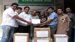 Lions Club Jammu Royal handing over medicines to DC Jammu for flood victims on Saturday. 