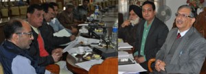 Chief Electoral Officer, Umang Narulla interacting with representatives of political parties at Srinagar on Monday.