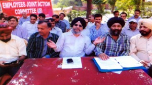 Leaders of EJAC(K) addressing a press conference at Jammu on Thursday.