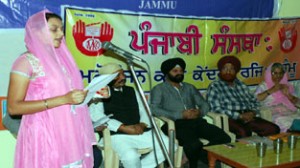 A poetess reciting her poetry in Punjabi during programme in Akhnoor.