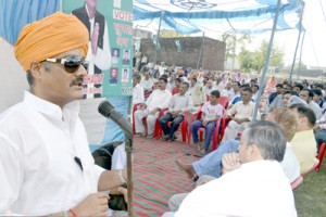 Senior PDP leader, Vikramaditya Singh addressing a public meeting at Bishnah in Samba district.