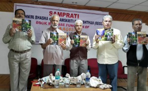 Scholars releasing two books of Rajinder Aagosh at K L Saigal Hall Jammu on Sunday.