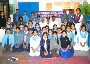 Scouts and Guides posing for a group photograph during the concluding ceremony of Pravesh Camp in Jammu. 