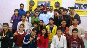 Winners posing for a group photograph along with officials during Jammu District Judo Championship.