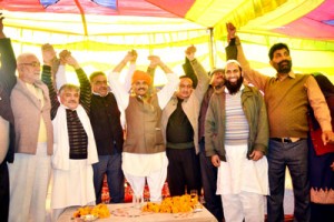 Vikramaditya Singh and PDP candidate from Nagrota constituency Hussain Ali Waffa during rally at Nagrota.