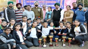 Prize winners posing for a group photograph with SSP Poonch, JS Johar and others during the concluding ceremony of State level Speedball championship at Poonch.