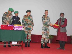 GOC-in-C, Northern Command, Lt Gen D S Hooda, felicitating an artisan at Udhampur on Saturday.