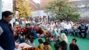 Former Minister Gulchain Singh Charak addressing a public meeting in Bishnah constituency.