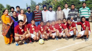 Players posing for a group photograph along with the dignitaries at Govt Polytechnic in Jammu.  