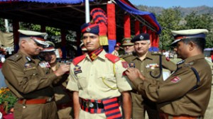 DGP, K Rajendra installing badges to pass-outs.