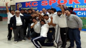 Winners of Indoor Cricket Tourney in a jubilant mood while posing for a group photograph. 