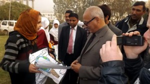 Dignitaries observing project during 22nd National Children's Science Congress.