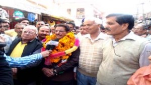 Cong candidate Gulchain Singh Charak during door-to-door campaign in Bishnah on Saturday.